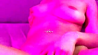 A hot girl passionately strips and fingers herself in a sensual solo session.