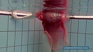 katya okuneva bathes in red dress at pool