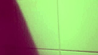 a cute teen babe bathing and playing in the shower