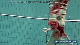 katya okuneva bathes in red dress at pool