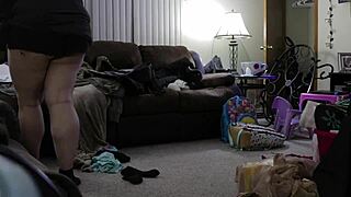 Chubby mom cleans the house in her shorts.