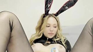 cute bunny having fun with clit and labia caresses clit and labia.