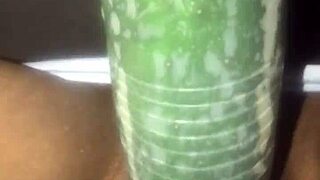 Kissesxxx fucks cucumber in public