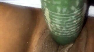 Kissesxxx fucks cucumber in public