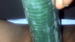 Kissesxxx fucks cucumber in public