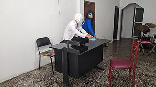 The doctor bangs his secretary on the desk at work, riding him sensually.