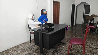 The doctor bangs his secretary on the desk at work, riding him sensually.