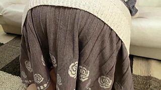 mature woman explores her anal hole in a solo appreciation session.