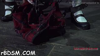 Babe in latex costume acquires punished