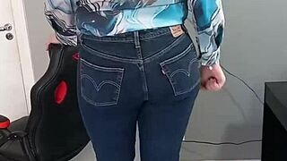 Beautiful tanned woman wearing bikini with tan lines