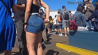 Candid view of big ass in shorts jeans