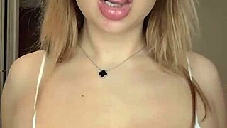 Cosplay bunny squeezes her natural big tits tightly in costume