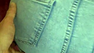 Hot wife enjoys a doggystyle session in tight jeans and receives a cumshot on her ass