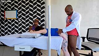 The doctor passionately fucks the patient right next to her unaware husband