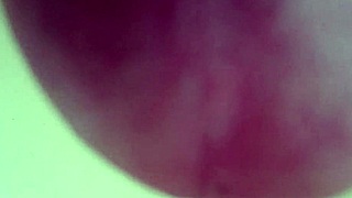 Pissing in the sink with closeup view.