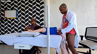 The doctor passionately fucks the patient right next to her unaware husband