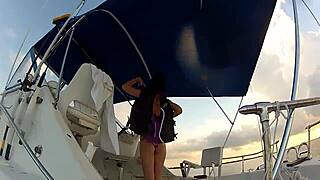 A woman flashes her tits on a boat in this public outdoor adventure