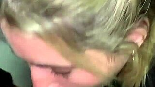 A person assists in the public restroom of a movie theater