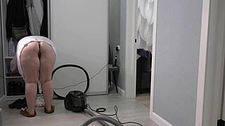 Watch this chubby milf housewife's thick ass and big boobs under her short robe behind the scenes?