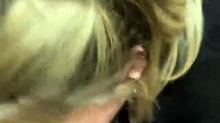 A person assists in the public restroom of a movie theater