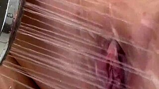 I gave Julia North a passionate blowjob in the shower, moaning as I swallowed her cum