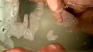 Daytona Hale relaxes with big tits in bath