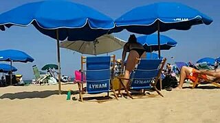 Candid on this little 18+ slut at the beach