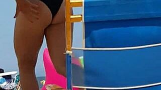 Candid on this little 18+ slut at the beach