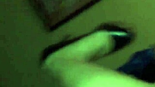 She stares into your eyes while licking her wet pussy close up.