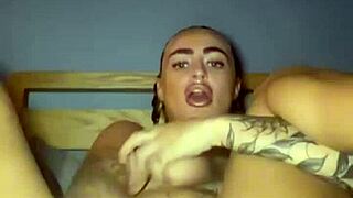 the emo goth slut fingers her pussy and ass hard till she squirts