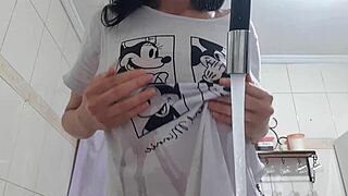 look at sexy latina maid washing dishes with huge tits fully exposed!