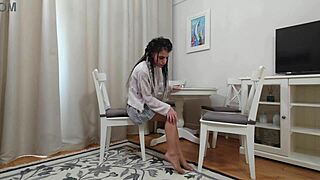 kim toy lifts plaid skirt in nude pantyhose to flash toned legs