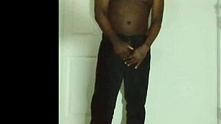 the artist sketches woman undressing from tight jeans