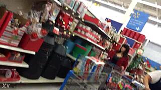 A candid mom browses the shop unaware