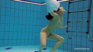 Kristy flaunts big boobs in bikini underwater pool