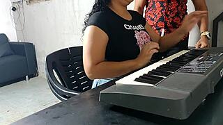 The Keyboard Teacher Disciplines His Young Student for Bad Behavior in Class