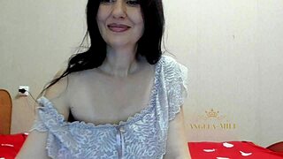 Mature brunette milf Angela shows off saggy tits and armpits in sexy homemade lingerie dance