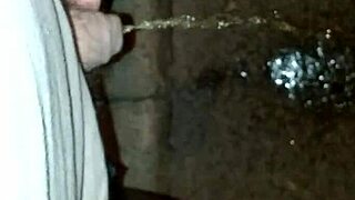 woman pees discreetly on empty street