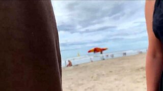 Public beach POV milf handjob blowjob on monster cock ends with big tits cumshot as watchers stare