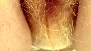 I'm peeing right through my hairy redhead pussy