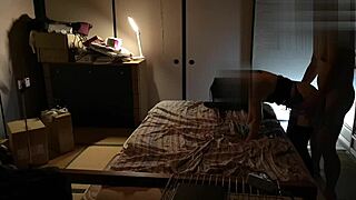 japanese babe strokes him hard from behind in stockings