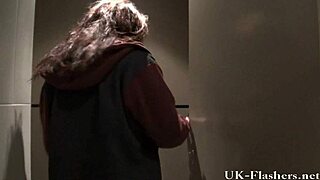 voyeur catches amateur babe fingering pussy wildly in public toilet