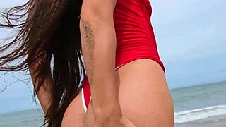 i feel so sexy in bikini splashing on tropical beach waves