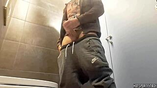 Sexy Bodybuilder Jerks Monster Cock in Risky Public Bathroom!