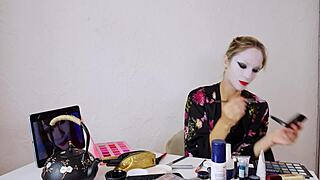 Blonde geisha applies makeup in cute sfw cosplay roleplay