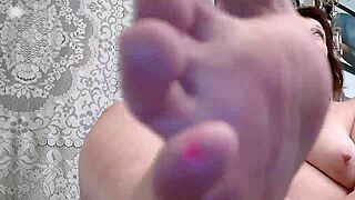 what's hotter her sexy slender feet or pink shaved pussy you get both in retro blue film