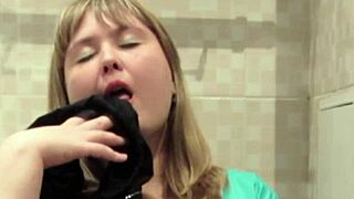 Chubby milf sniffs panties fingers hairy pussy masturbates in toilet hides them inside