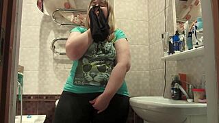 Chubby milf sniffs panties fingers hairy pussy masturbates in toilet hides them inside