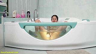 Teen Katty West fingers her tight pussy in bathtub