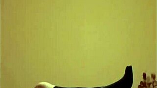 Maitresse K dominates slave in stockings and heels